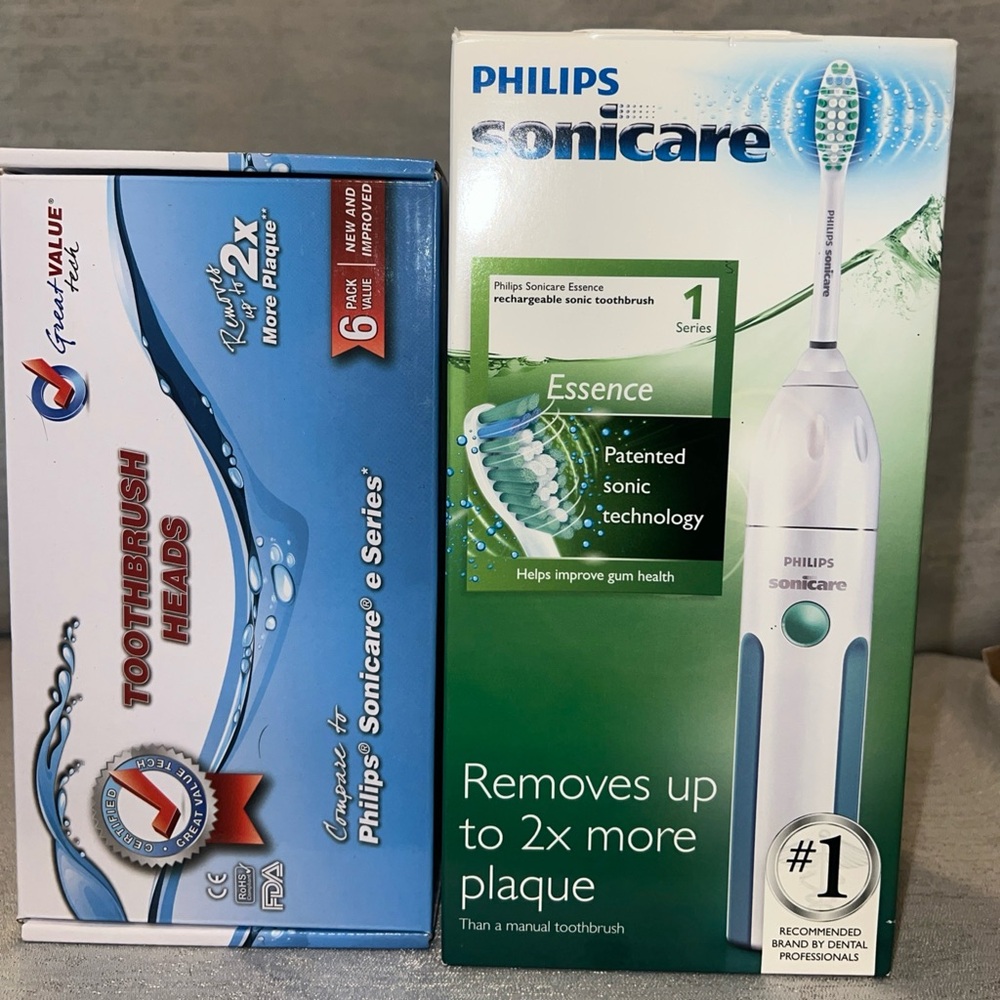 Philips Sonicare Essence Sonic Rechargeable Electric Toothbrush & replacement